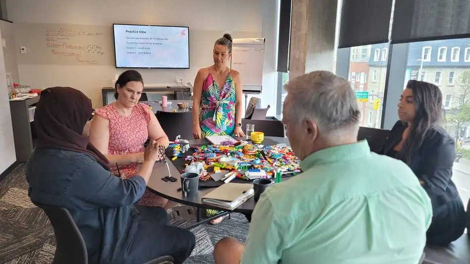 A participant facilitating a practice workshop on Day 2 of the July Ottawa cohort